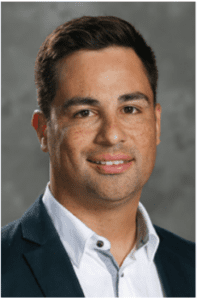 headshot of Rays vice president and assistant general manager Carlos Rodriguez